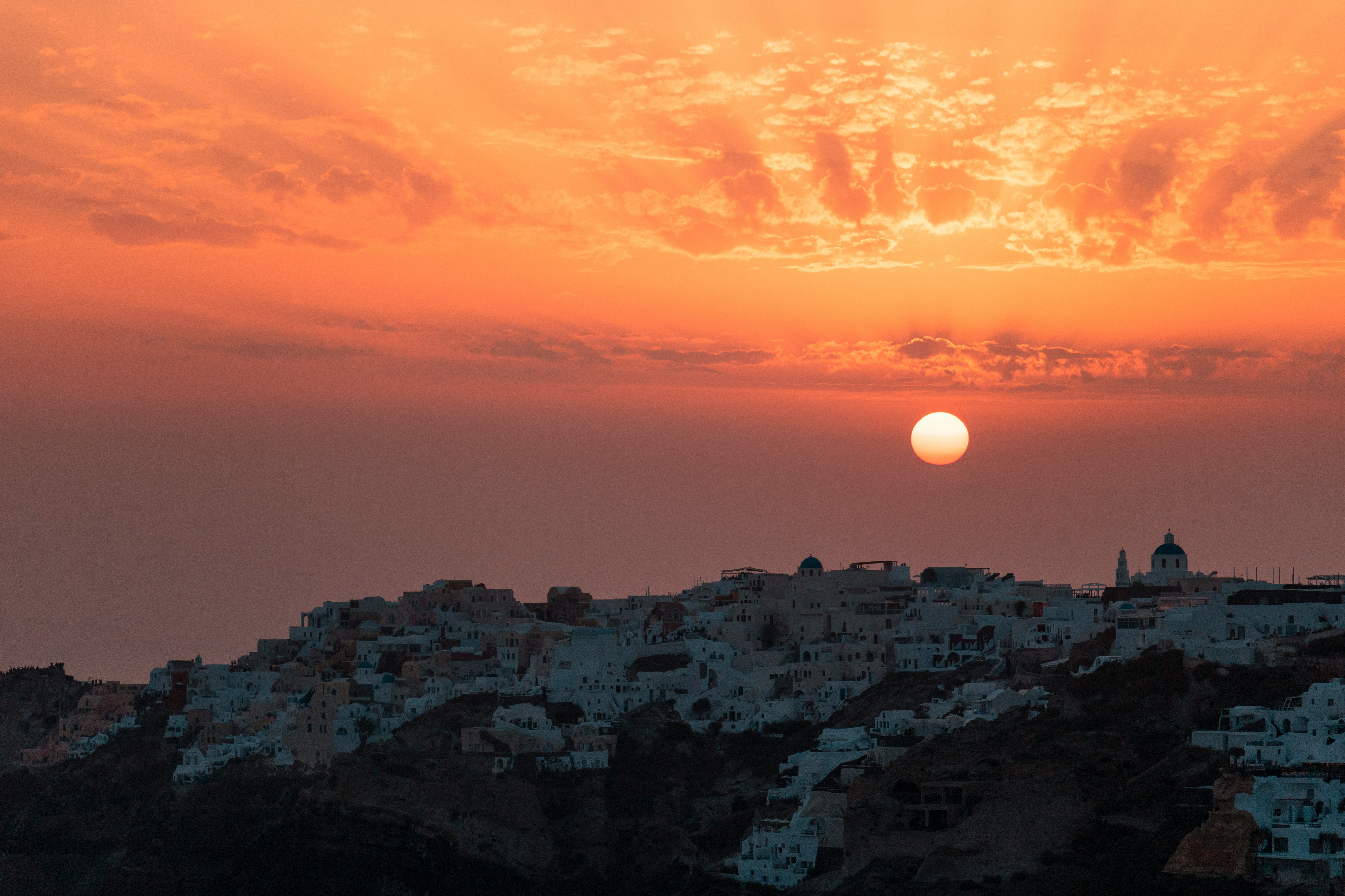 houses on hill during golden hour